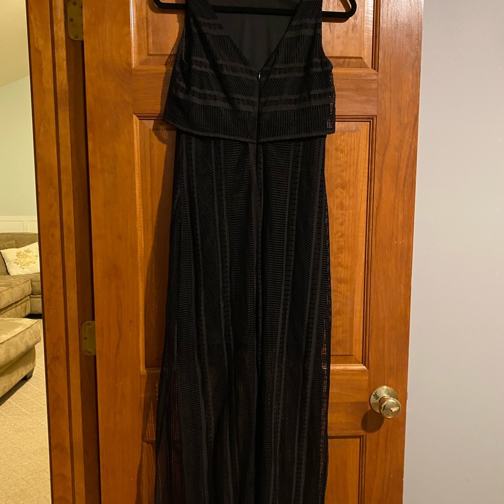 Floor length outer see through layer with slits on side, mini skirt under layer